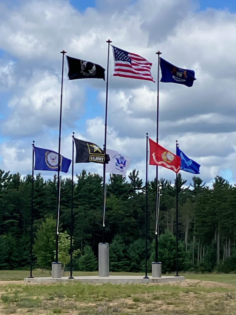 military flags on display at the Croton facility