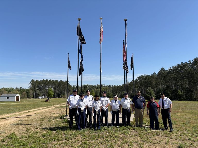 CSYDV volunteers and veterans gathered at the flag display at the Croton facility