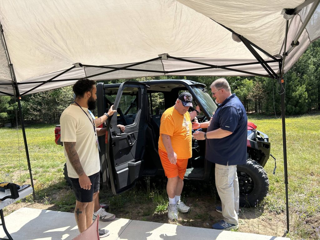 Veteran steps out of an ORV at the croton facility