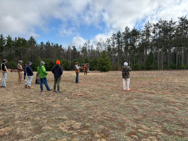 program participatns get ready to fire at the shooting range