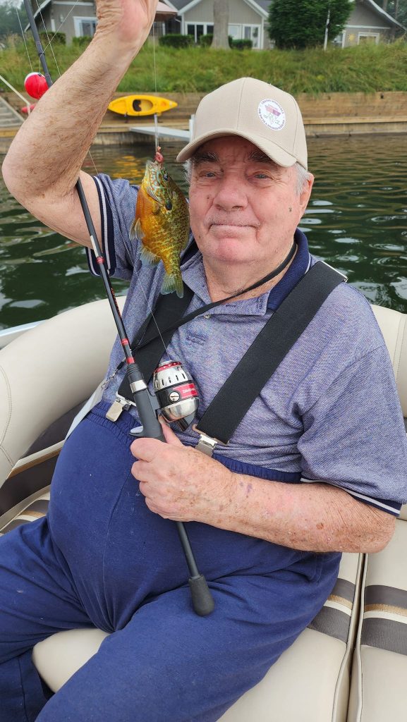 Veteran shows off his fresh catch on a fishing trip