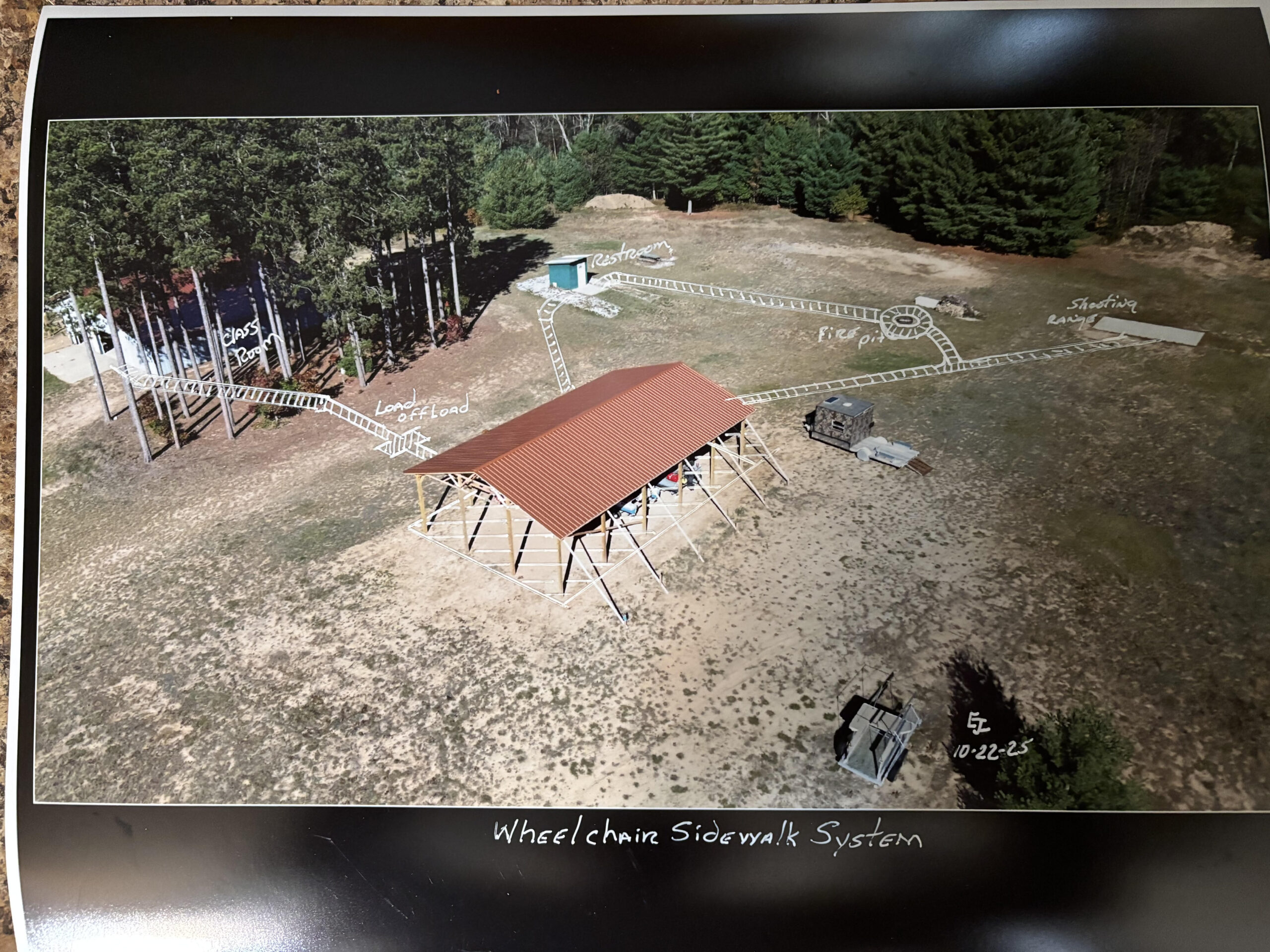aerial photo of the Croton facility with hand-drawn white overlay of sidewalk project plans